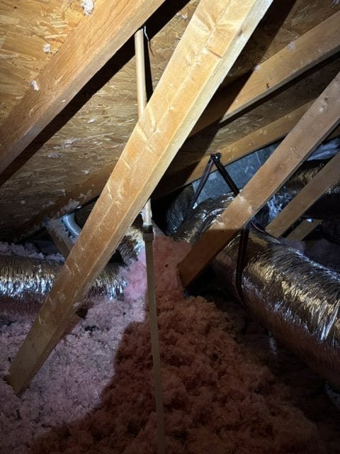 Finished attic ductwork support after service