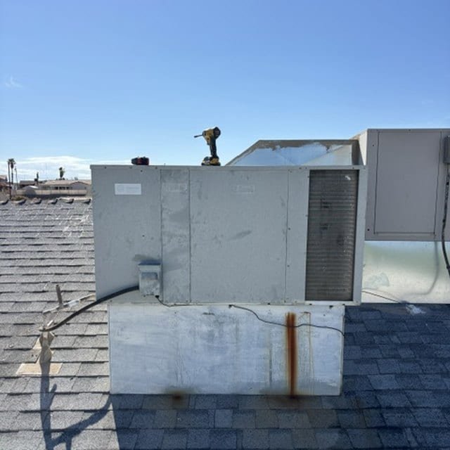 Existing rooftop package unit before replacement