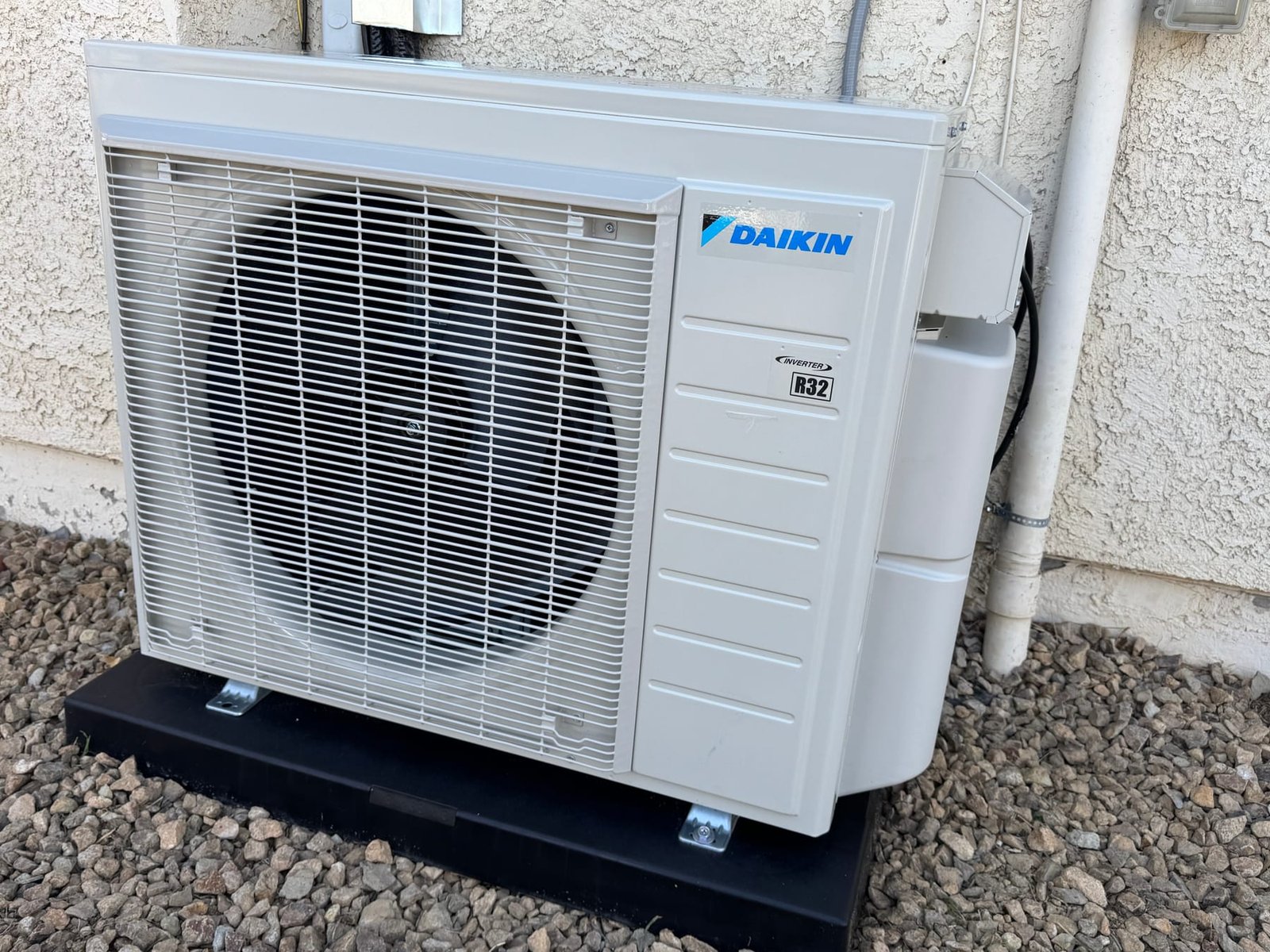 Outdoor condenser from a dual mini-split installation