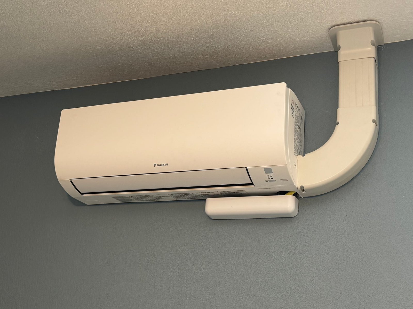 Second indoor mini-split unit with finished line-set cover
